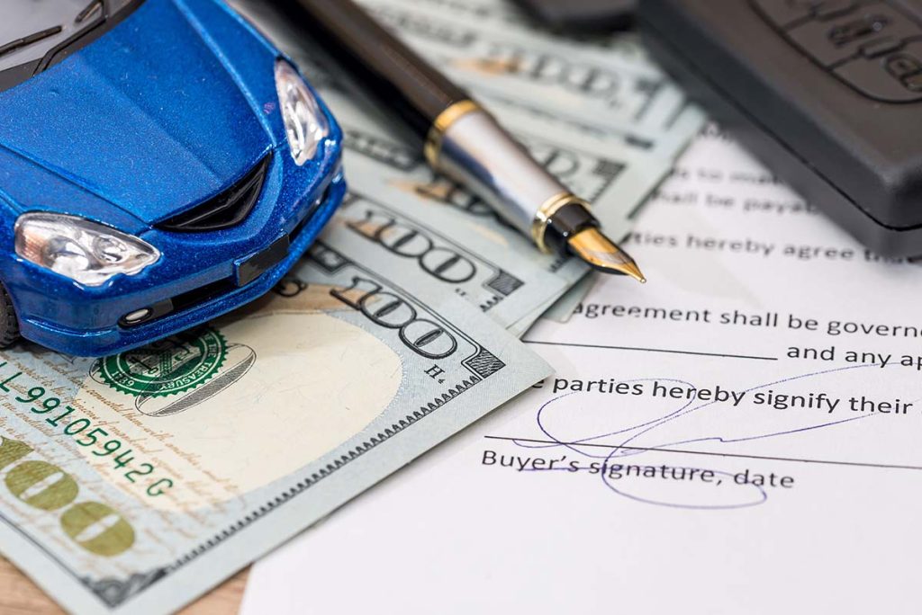 Toy Car, Money and pen on documents