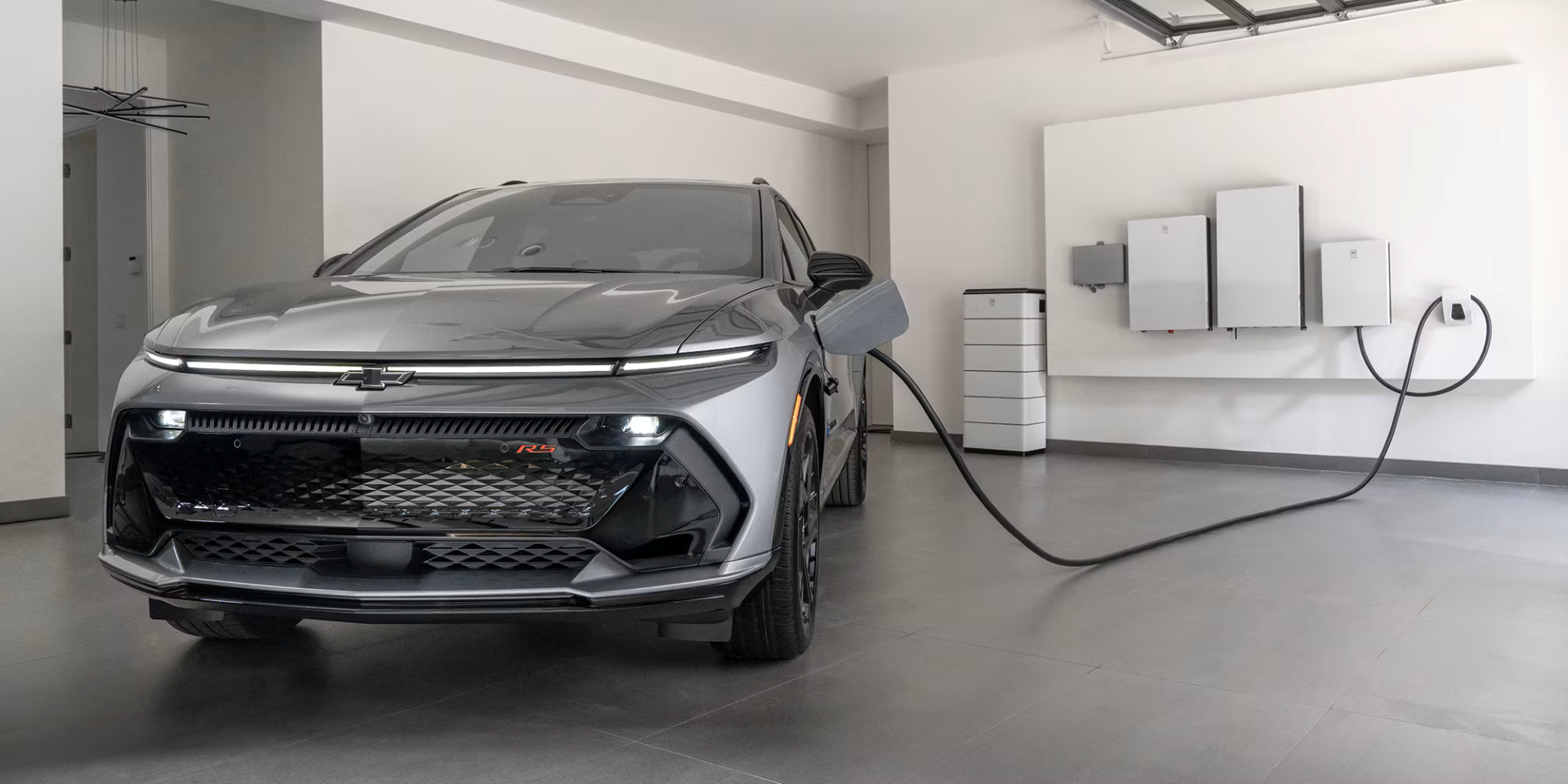 2026 Chevrolet Equinox EV charging in a garage
